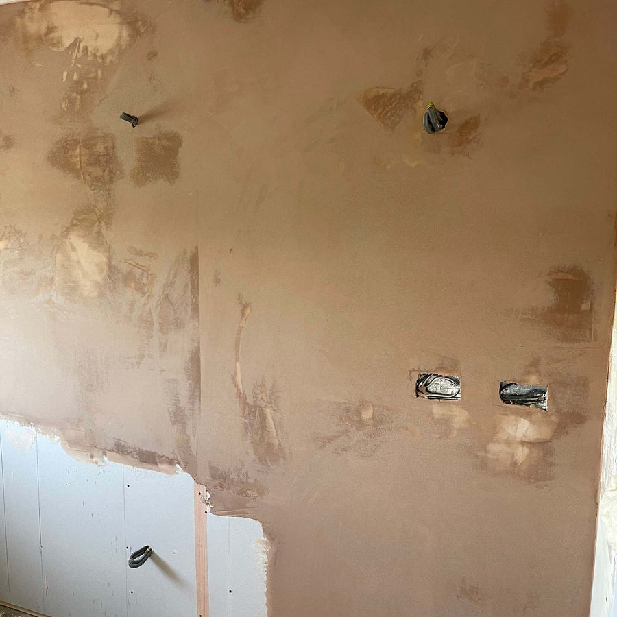 Wall opened up ready for insulation and repair